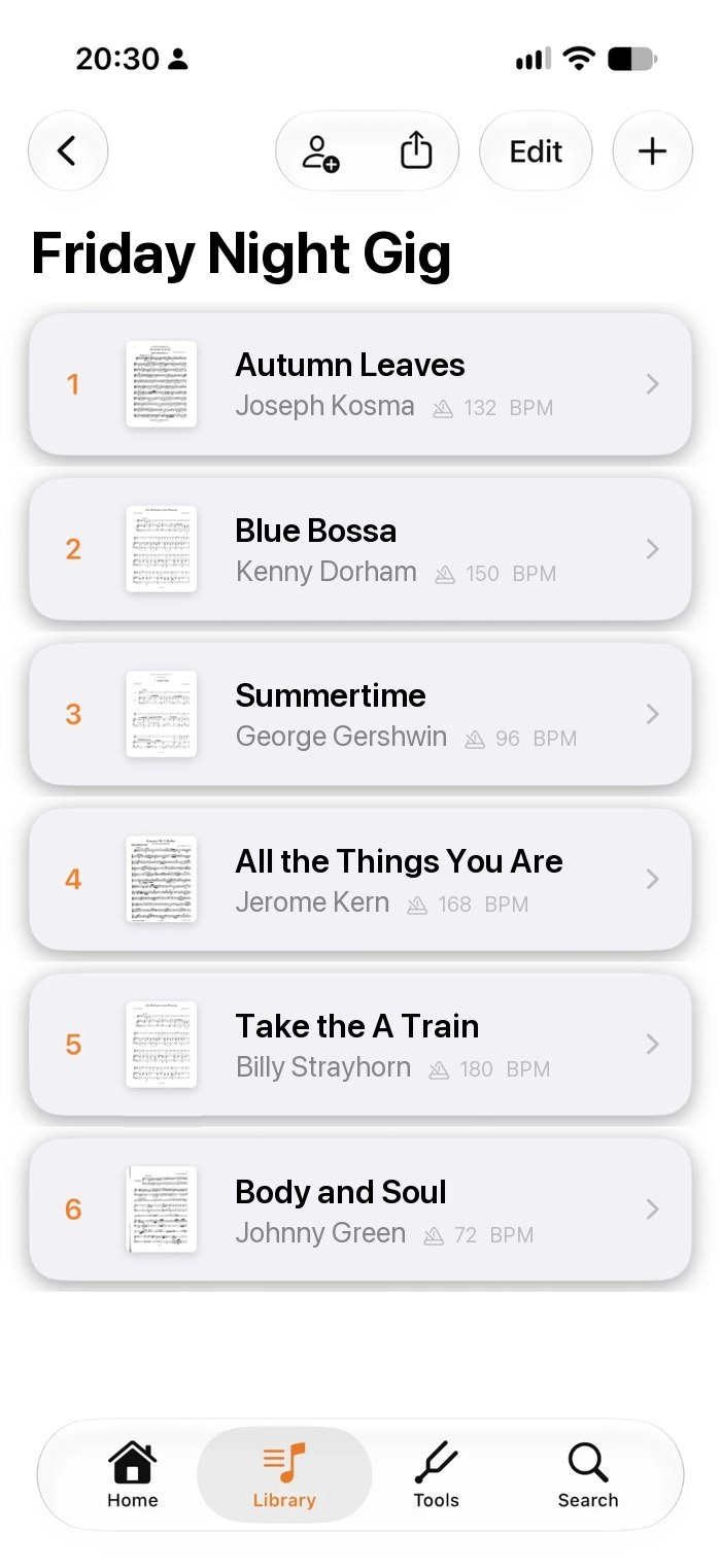 A set list called Friday Night Gig in Music Folder on iPhone: six jazz standards in playing order, each with composer and tempo