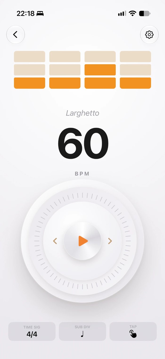 The Music Folder metronome on iPhone: 60 BPM in 4/4 with accented beats, a tempo dial and tap tempo